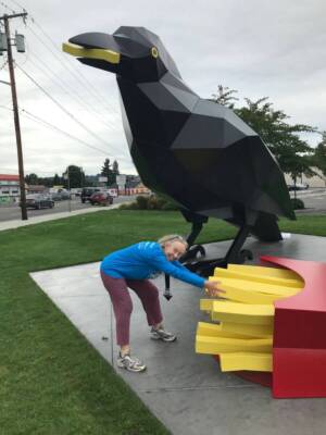 Attempting to steal from Crow with Fries, an artwork by Peter Reiquam, in Auburn, WA